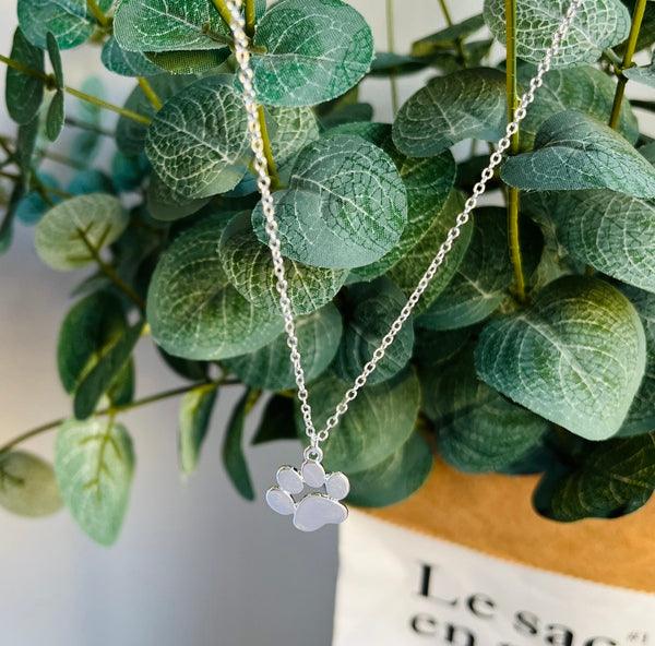Elegant silver paw print pendant necklace