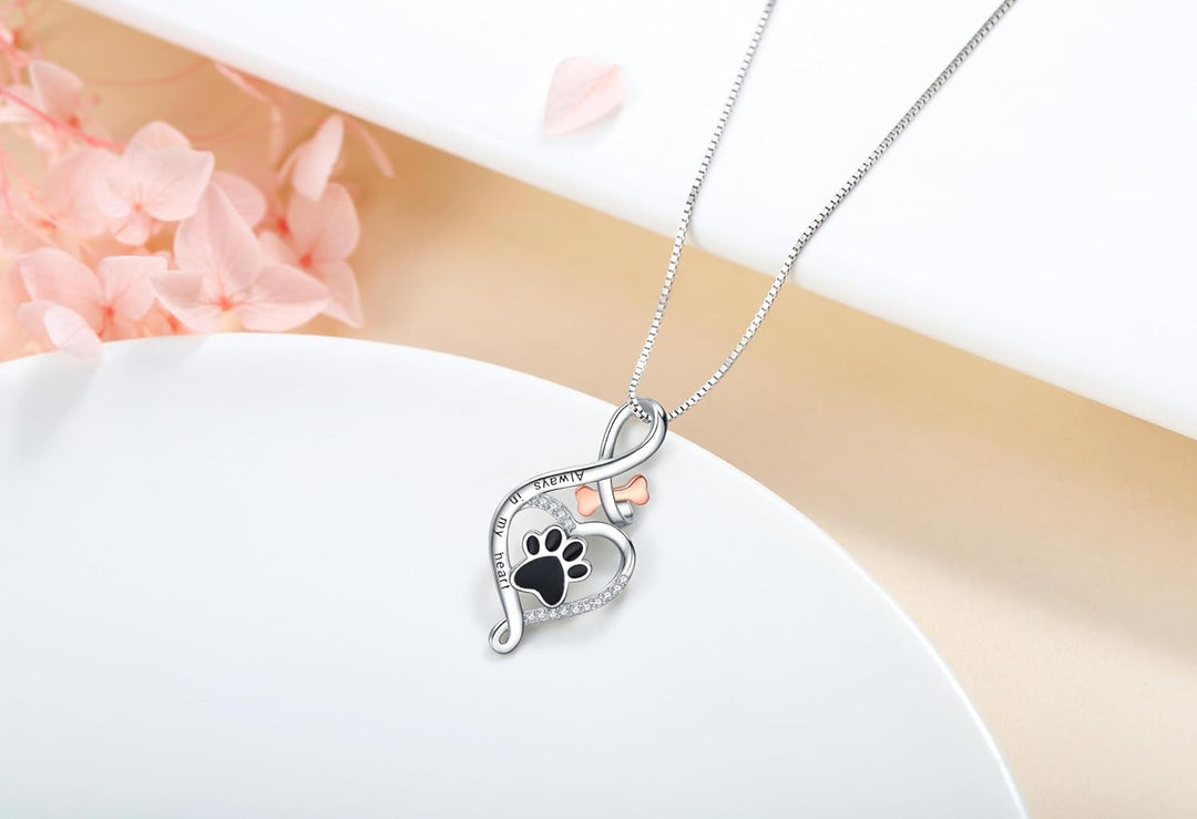 Lucky paw necklace with heart, bone, and infinity symbol