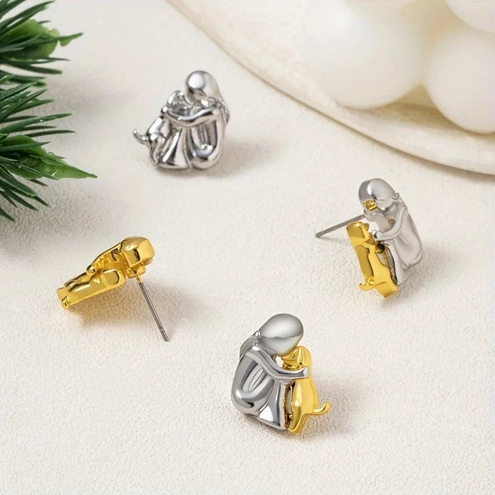 Two-tone silver and gold hug earrings
