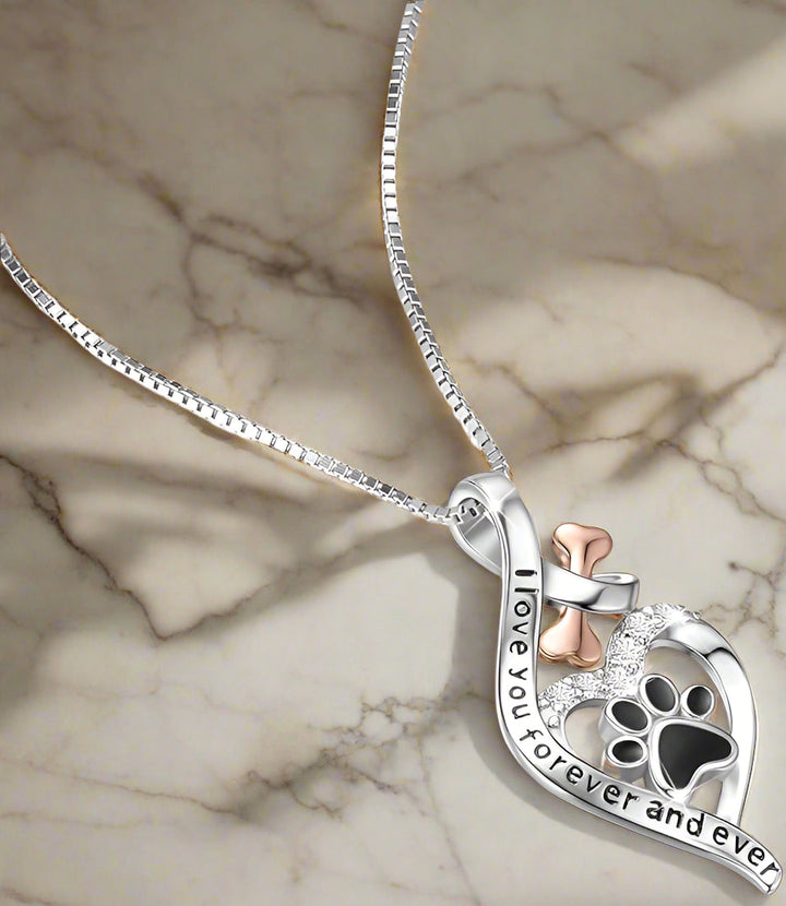 Lucky paw necklace with heart, bone, and infinity symbol