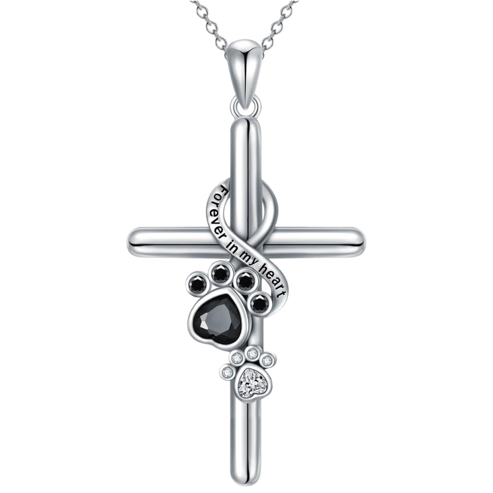 Silver paw print and cross pendant